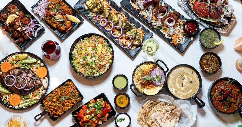 Assortment of dishes, sides and condiments served on the table