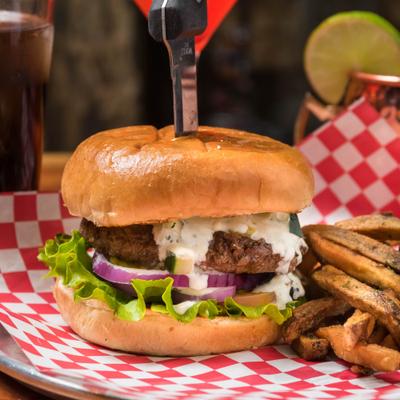 Greek burger, knife through the middle