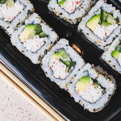 Crab meat sushi rolls, with avocado and cucumber.