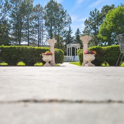 Entrance in garden between two poles