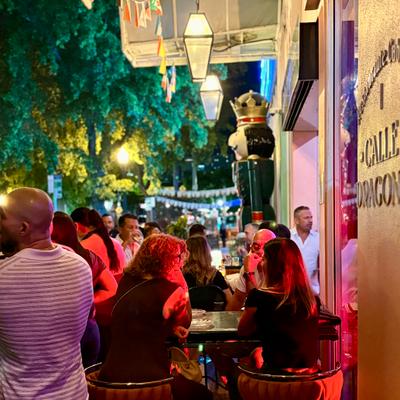 People at the terrace at night.