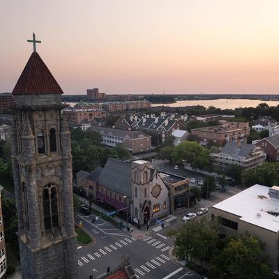 A wide shot of the street corner where the restaurant is.