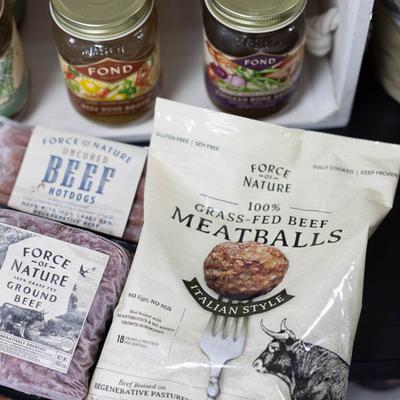 Various goods in packs and jars.