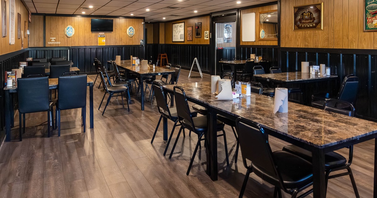 Interior, tables and chairs ready for guests