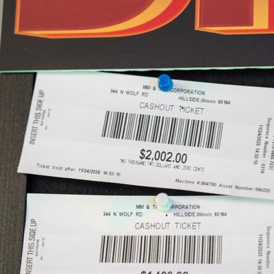 Close-up view of printed vouchers.