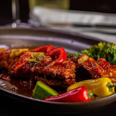 Dish of whole fish and peppers