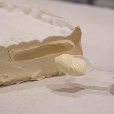 Cream cheese on a spoon.