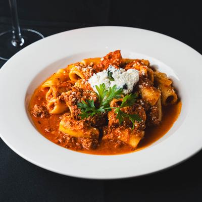 Rigatoni Bolognese, close-up.