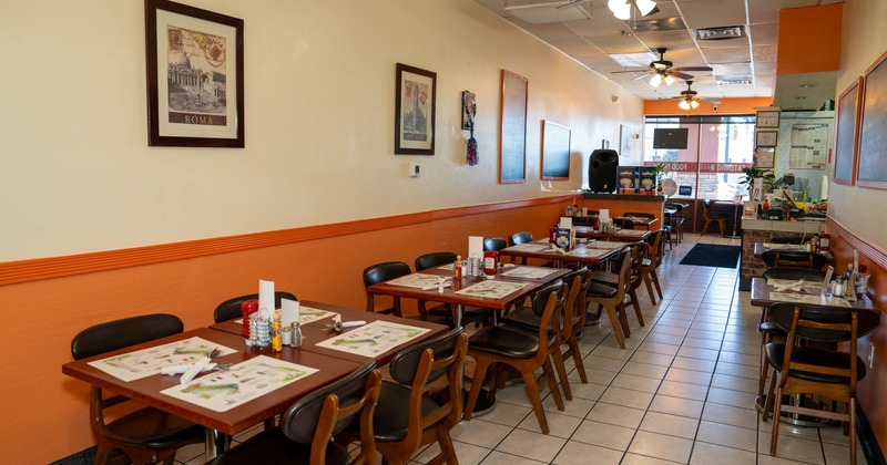 Interior, seating area, tables ready for guests