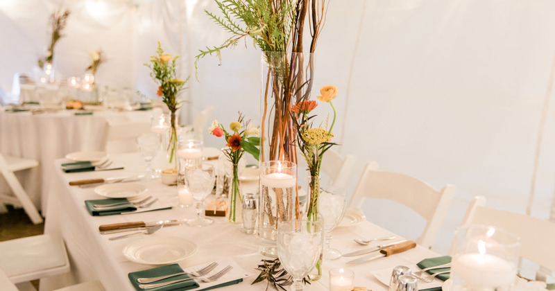 Tables set and decorated for a banquet event