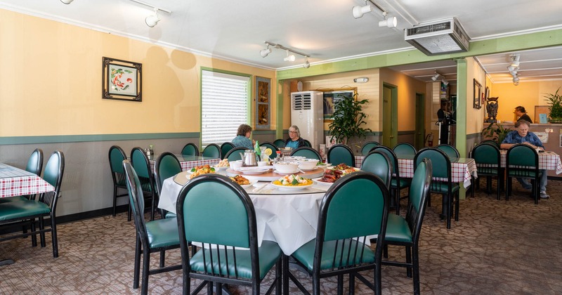 Dining space, tables ready for guests