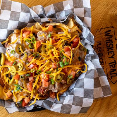 Low Country salad of mixed greens, vegetables, ham bits, and cheddar cheese.