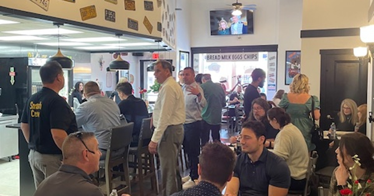 Customers dining and drinking