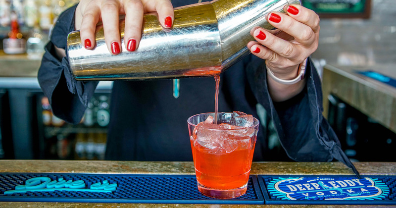 Staff preparing cocktail