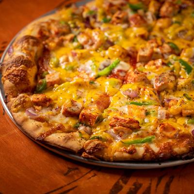 BBQ pork pizza, with cheddar, green peppers and red onion