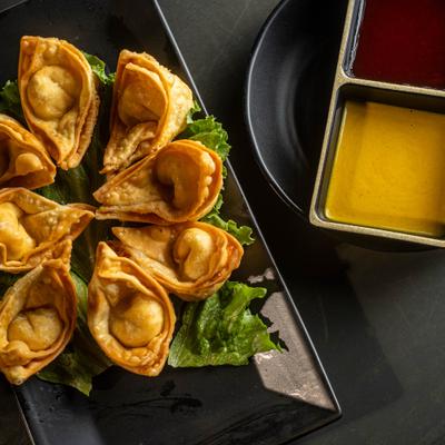 Crispy wontons served with two dipping sauces.