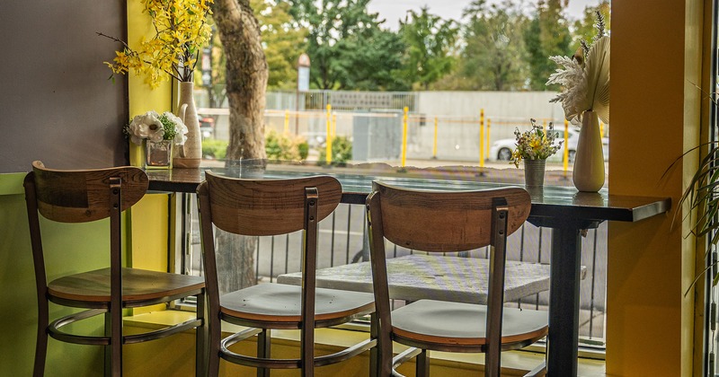 Cozy seating corner next to a large window