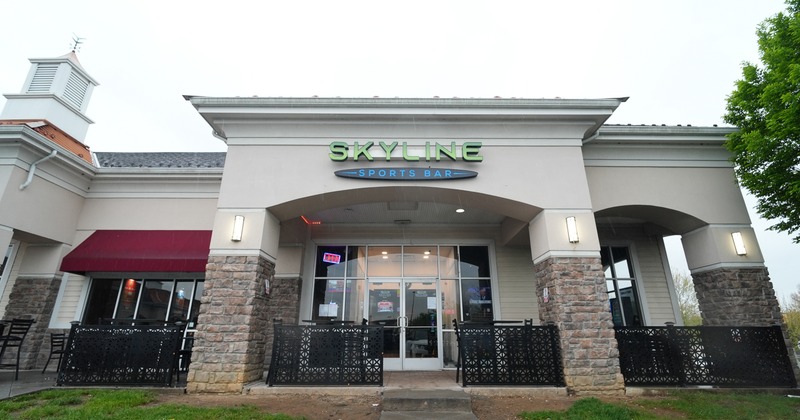 Exterior, front view to restaurant, entrance, sign above