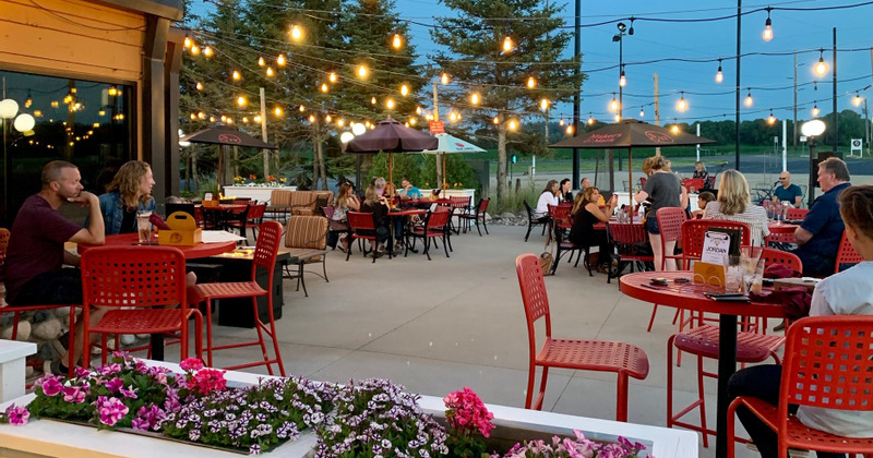 Exterior, guests enjoying themselves in the garden