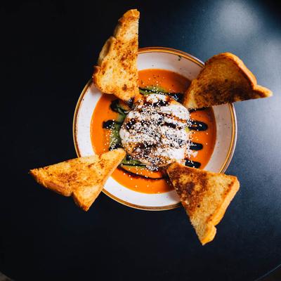 Burrata, with tomato jam, pesto, fig balsamic, and garlic toast.