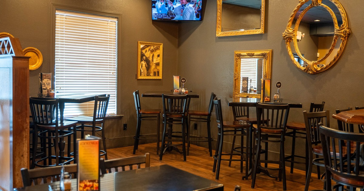 Interior, tables and stools ready for guests