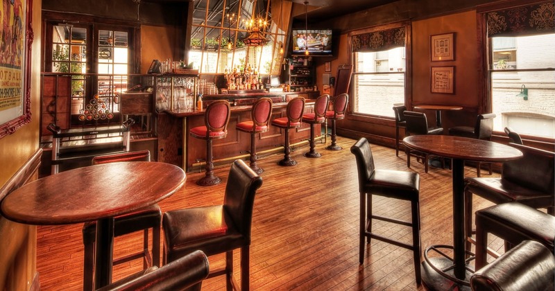 Bar room, High ceilings and bar top in front of windows