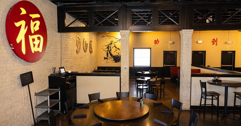 Cozy interior dining area with dining tables ready for guests