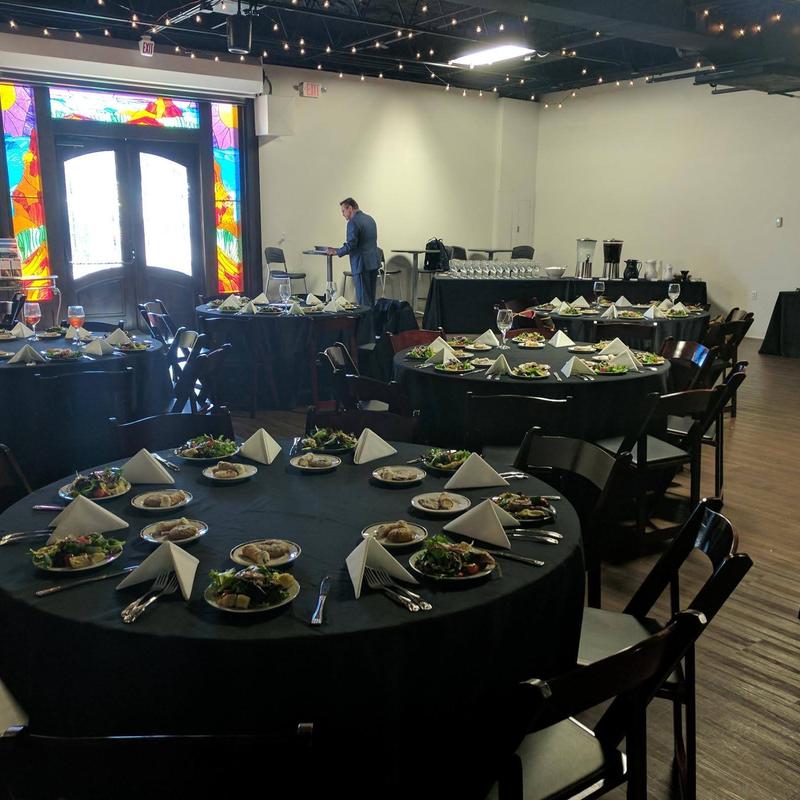 Interior, round tables with tableware