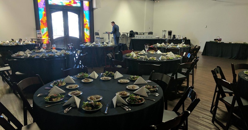 Interior, round tables with tableware