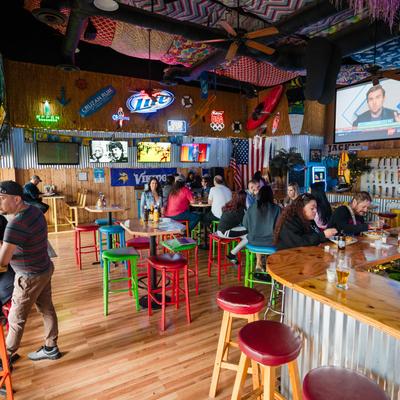 Interior, wide view to bar area.