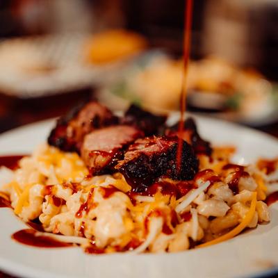 Loaded Mac and Cheese, with brisket and BBQ sauce.