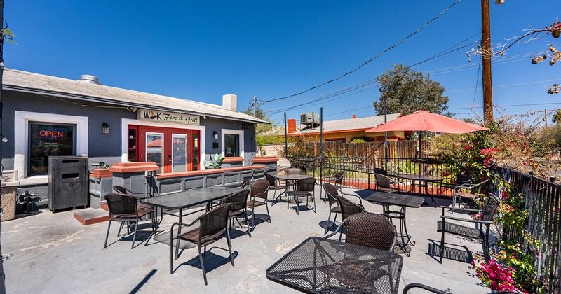 Outdoor seating area in front of entrance