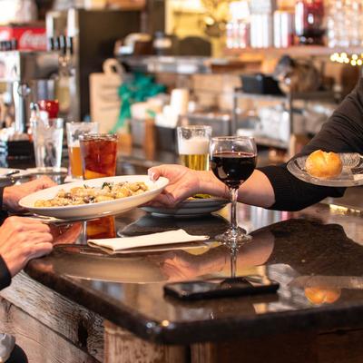 Employee serving a customer.