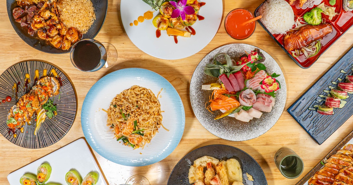 Assortment of dishes served on the table with drinks, overhead view