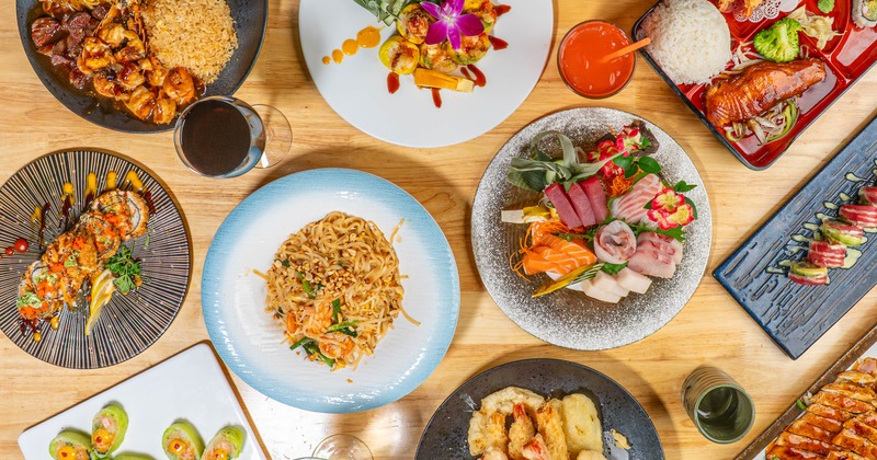Assortment of dishes served on the table with drinks, overhead view