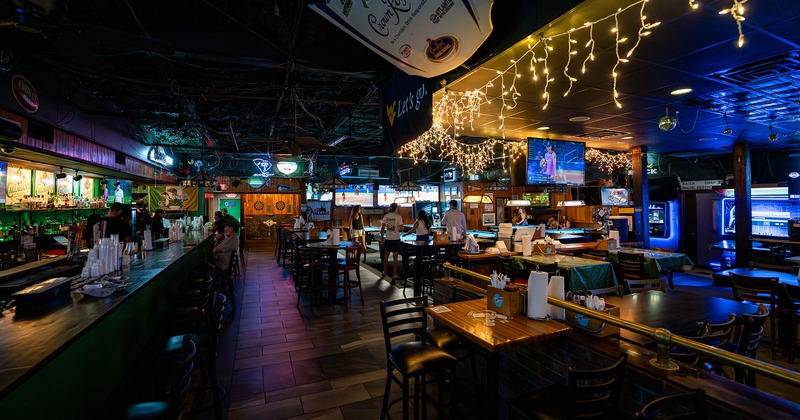 Irish sports pub interior space, bar and seating area