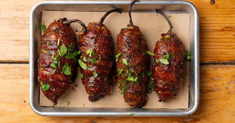 Different types of grilled meat, bread and salad on the side