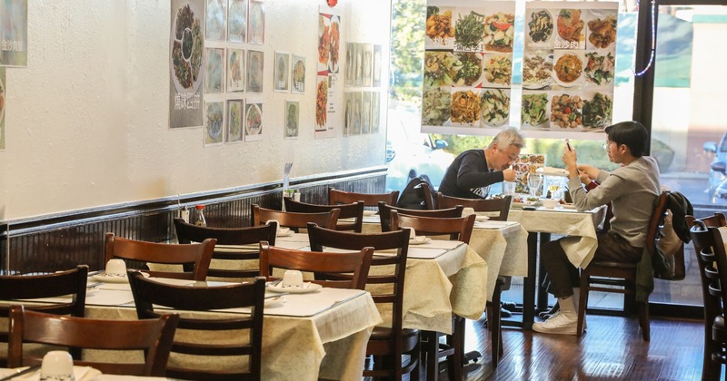 Interior, diner area, tables, chairs, guests