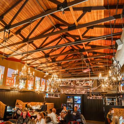 Restaurant interior, dining area under the wooden beams.