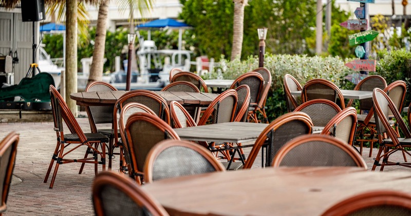 Exterior, patio, tables and chairs ready for guests