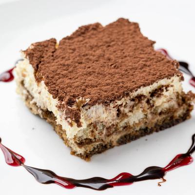 Tiramisu topped with cocoa powder.