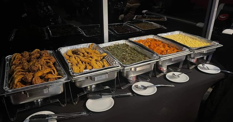 Catering trays with assorted dishes on a table