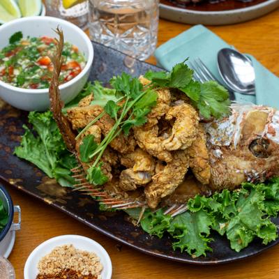 Deep-fried turmeric and lemongrass rubbed snapper fillet served with spicy seafood sauce.