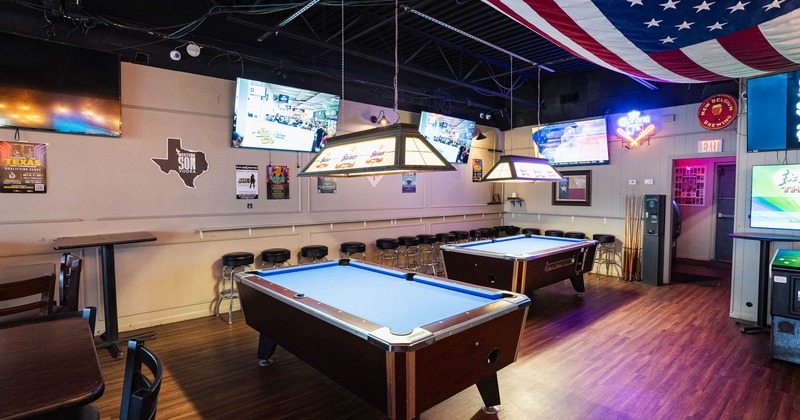 Interior, pool tables and chairs