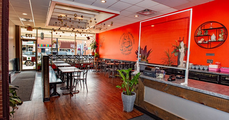 Wide view of diner area, tables and chairs