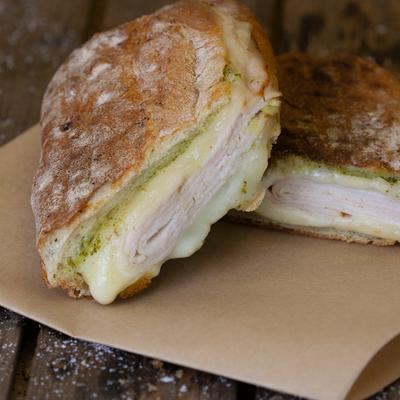 Turkey and Herbs sadwich with mozzarela and pesto.