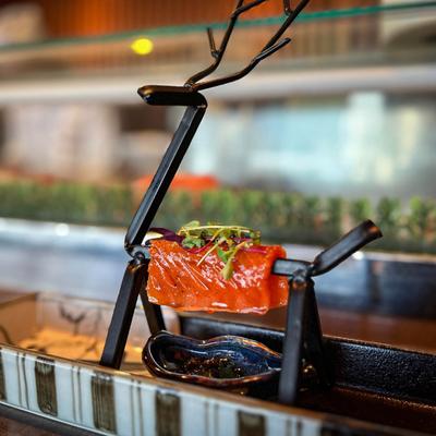 Deer statue, with a salmon slice serving as a saddle