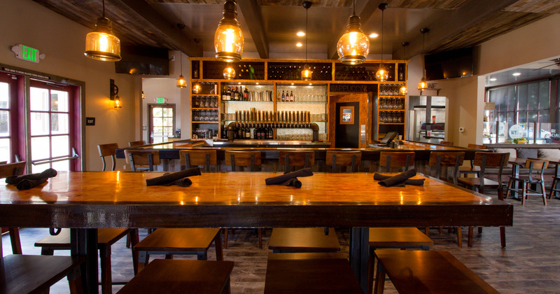 Interior, tall tables, barstools and beer taps