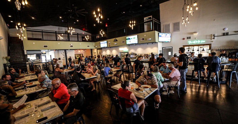 Restaurant interior full of guests
