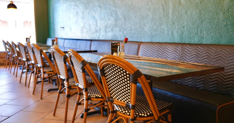 Interior, tables, chairs and benches lined up